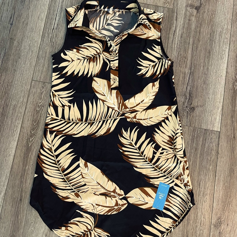 Brand new dress tags on, black with a brown tropical print.